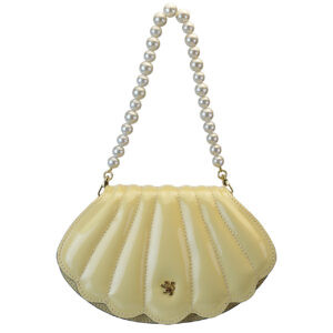 The Conchiglia is a semi-rigid shoulder bag made of fine Italian patent leather. It features a magnetic flap closure and offers ample interior space. An internal LED light with a timer makes it easy to find your favorite small items. The hardware is gold-tone. It comes with a removable handle embellished with eco-friendly pearls and a cotton pouch. The Conchiglia bag, with its precious and exquisite craftsmanship, combines elegance and versatility, gracefully completing any outfit. Made in Italy by the prestigious Florentine brand Pratesi.