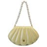 The Conchiglia is a semi-rigid shoulder bag made of fine Italian patent leather. It features a magnetic flap closure and offers ample interior space. An internal LED light with a timer makes it easy to find your favorite small items. The hardware is gold-tone. It comes with a removable handle embellished with eco-friendly pearls and a cotton pouch. The Conchiglia bag, with its precious and exquisite craftsmanship, combines elegance and versatility, gracefully completing any outfit. Made in Italy by the prestigious Florentine brand Pratesi.